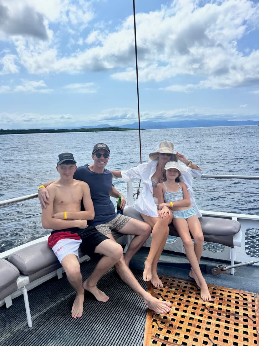 Our family on the bow of the Bali Hai catamaran — one of the best days of the whole trip