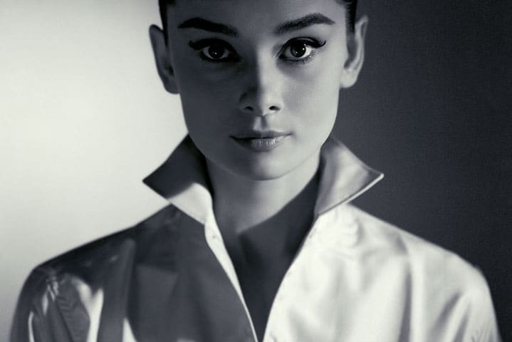 Close-up of expertly defined eyebrows showcasing iconic arch and shape definition