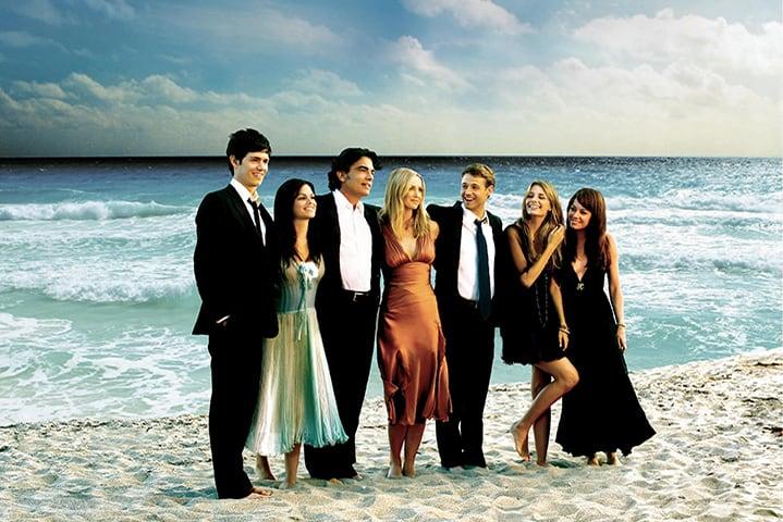 Cast of The OC in Season 3 promotional photo featuring iconic 2000s hairstyles and makeup looks