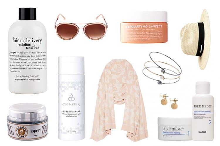 Flat lay of five facial exfoliant products including powders, peeling gels and treatment kits on a white surface