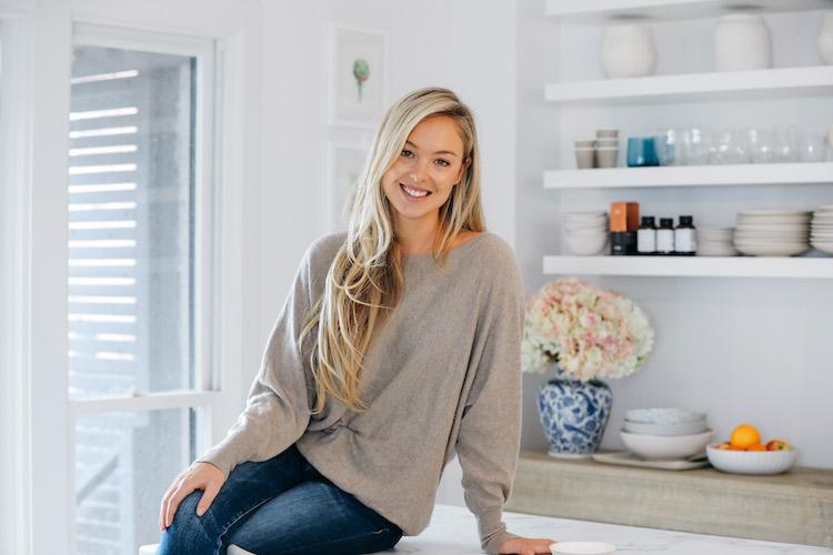 Jessica Sepel in natural makeup and casual white shirt, embodying her minimalist beauty approach