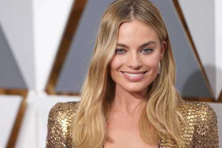 Collage of celebrity beauty looks featuring red carpet makeup, styled hair and glamorous NYE-ready beauty inspiration