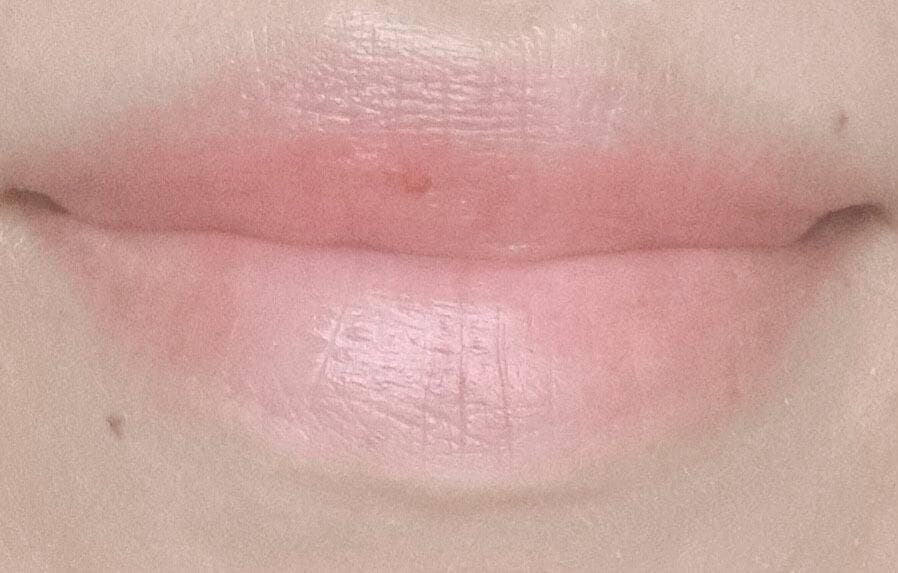 Lipstick tattoo at four months — settled into a subtle peach tint