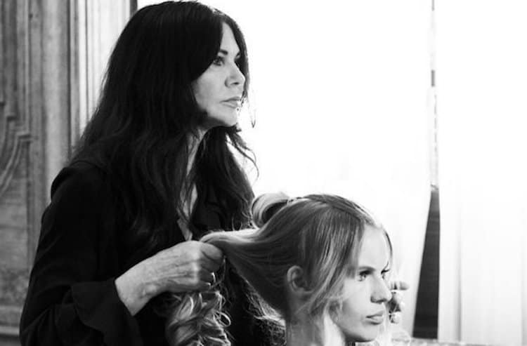 Celebrity hairstylist Wendy Iles styling long textured waves with natural volume and graduation around the face