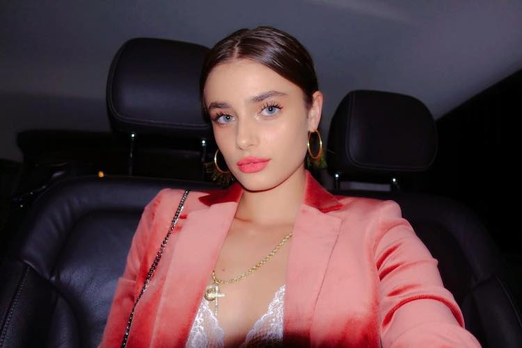 Peachy-toned blush and watermelon-coloured lip products displayed on a neutral background