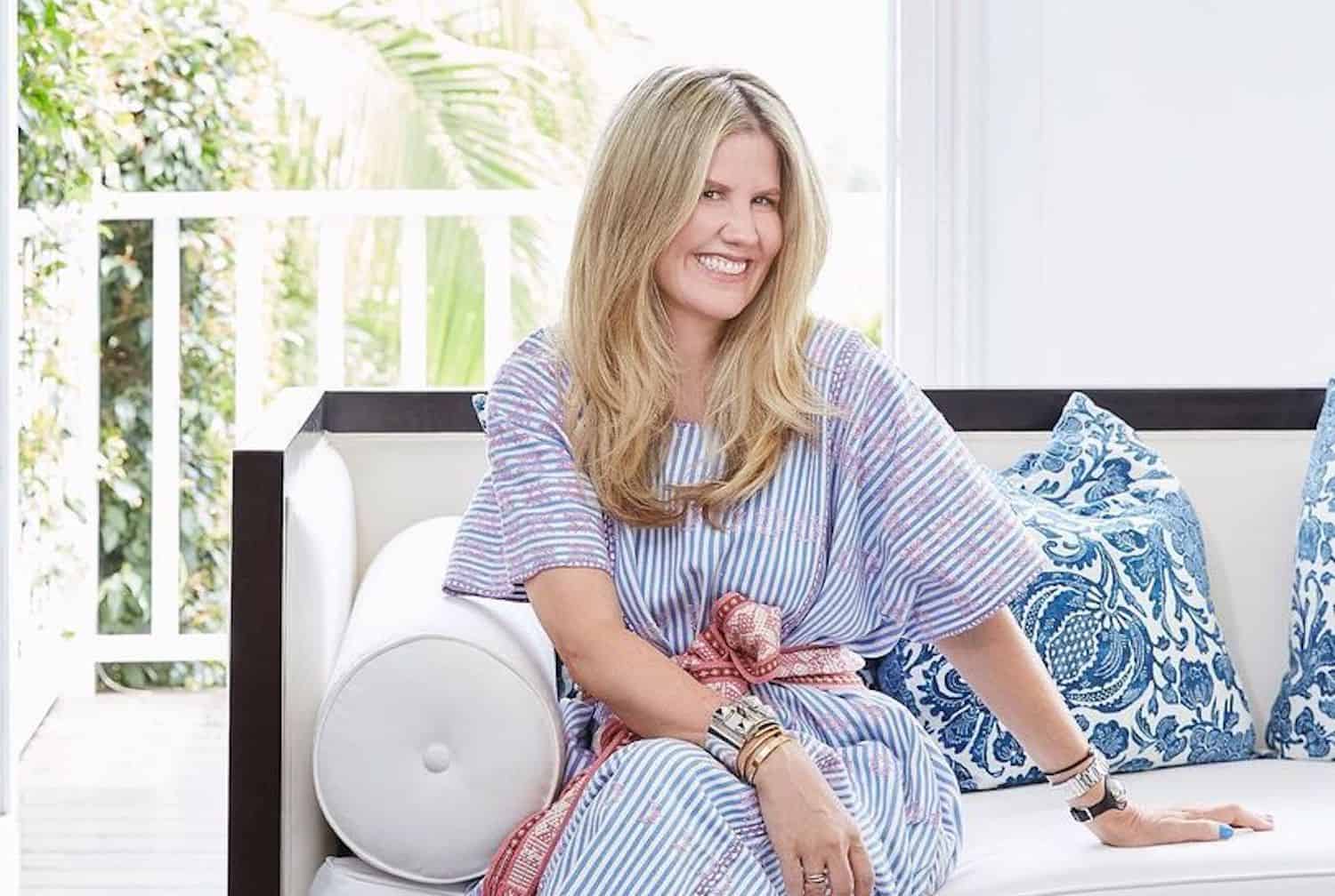 Pippa Holt wearing a vibrant patterned kaftan with colourful accessories and statement jewellery