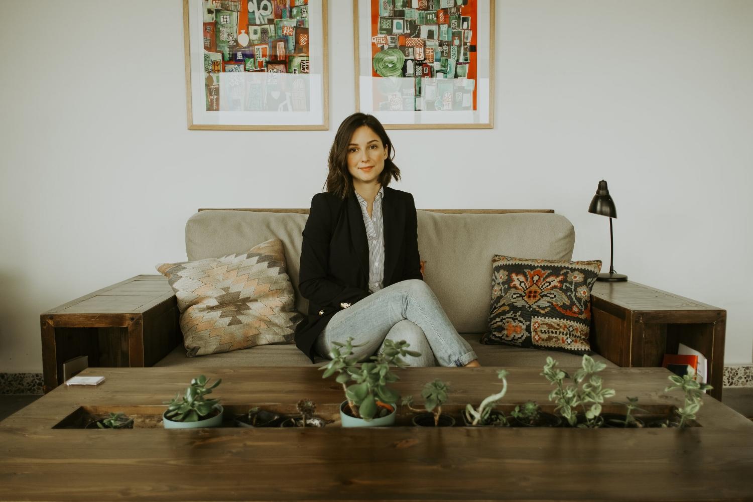 Sara Kuburic, millennial therapist, in a candid portrait shot showcasing natural beauty and approachable confidence