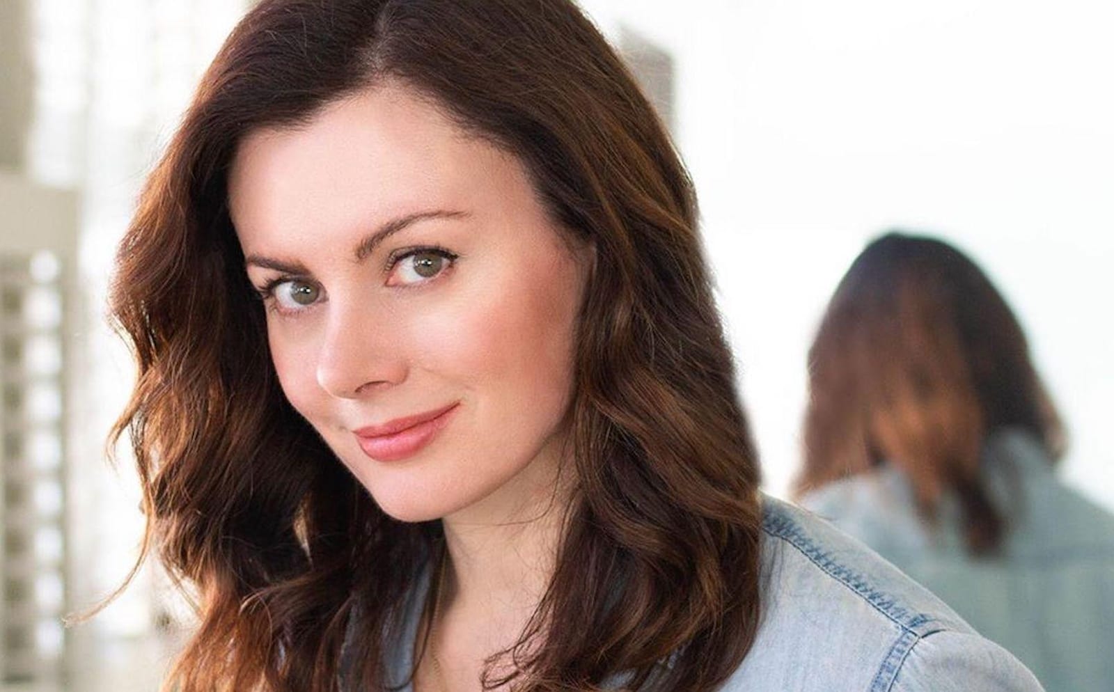 Dr Sam Bunting, dermatologist and skincare expert, photographed in professional setting