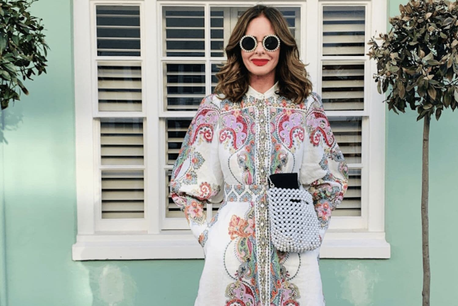 Trinny Woodall wearing Mother Earth eyeshadow, smiling at camera with colourful makeup