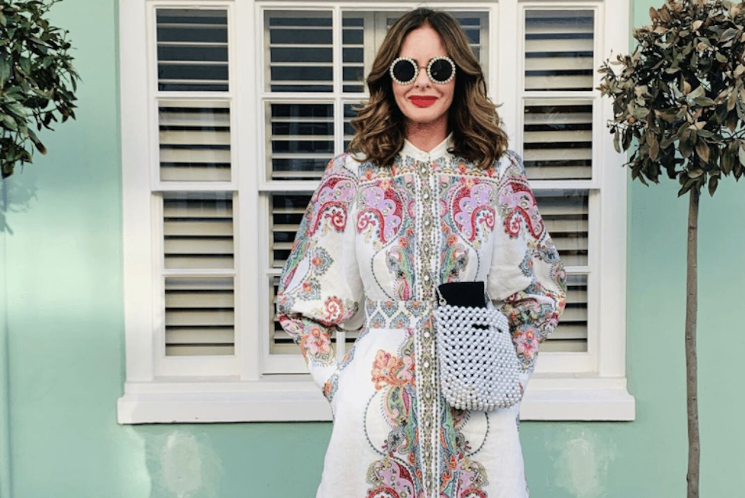 Trinny Woodall wearing Mother Earth eyeshadow, smiling at camera with colourful makeup