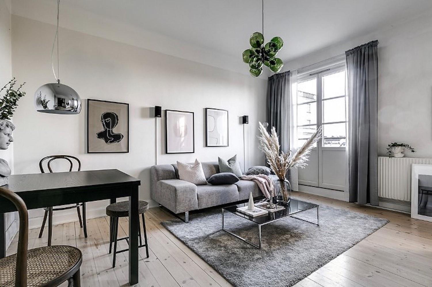 Bright Scandinavian-style living room with minimalist furniture, natural light and Nordic décor