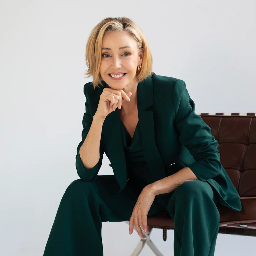 Terri Vinson Jones, cosmetic chemist and founder of Synergie Skin, in a green suit for Beautiful Inside by Beauticate