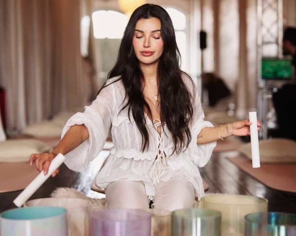 Tanya Ali Jalani playing crystal singing bowls during a sound healing session, Beautiful Inside by Beauticate