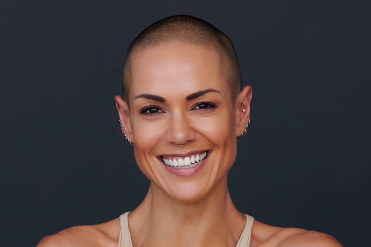 Leah Simmons, founder of KAAIAA, smiling in a press portrait for Beautiful Inside by Beauticate