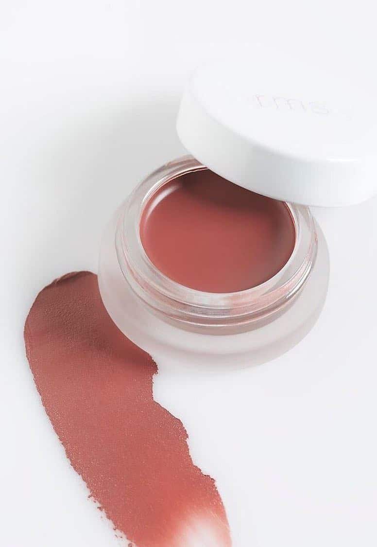 Open RMS Beauty pot in dusty rose with a creamy colour swatch on a white background