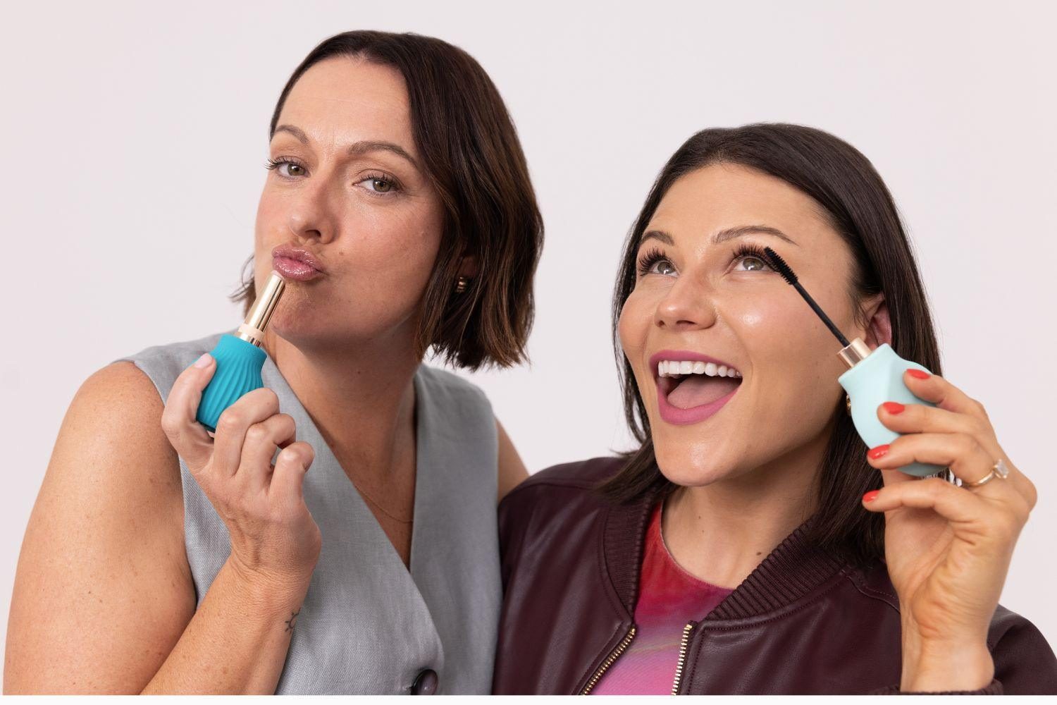 Celeste Barber and Storm Menzies applying makeup together