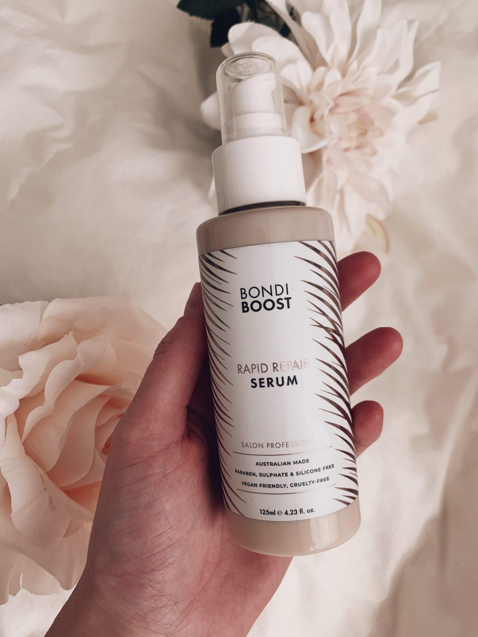 Hair care products for thicker, denser hair flatlay by Grace Parsons
