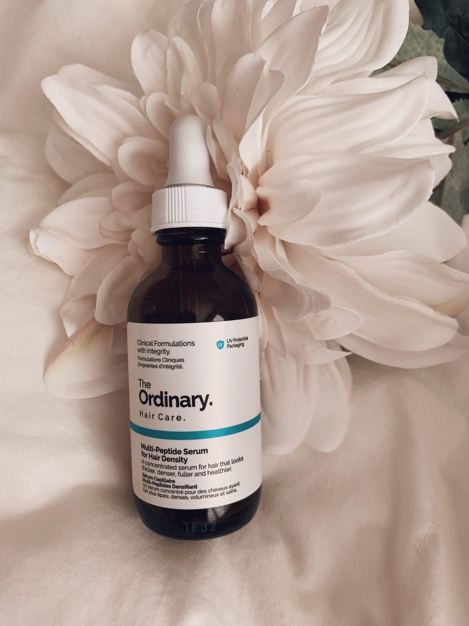 The Ordinary Multi-Peptide Serum for Hair Density applied to scalp before bed