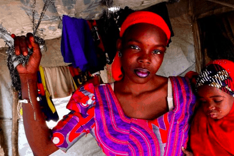 Image: @doctorswithoutborders 18-year-old Awa, with 1-year-old daughter, Amina, lives in the Dar Es-Salaam camp. She was forced to move when her home in Doron Baga, Nigeria, was destroyed by Boko Haram in 2015. Just one of the many people aided by the work of DWB.