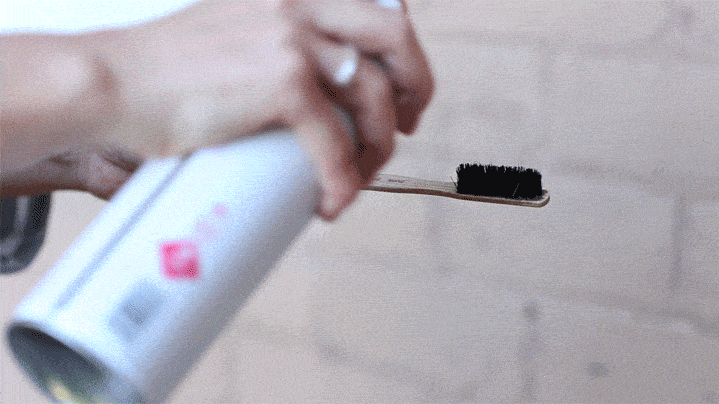Step 7. Spray your eyebrow brush with hairspray
