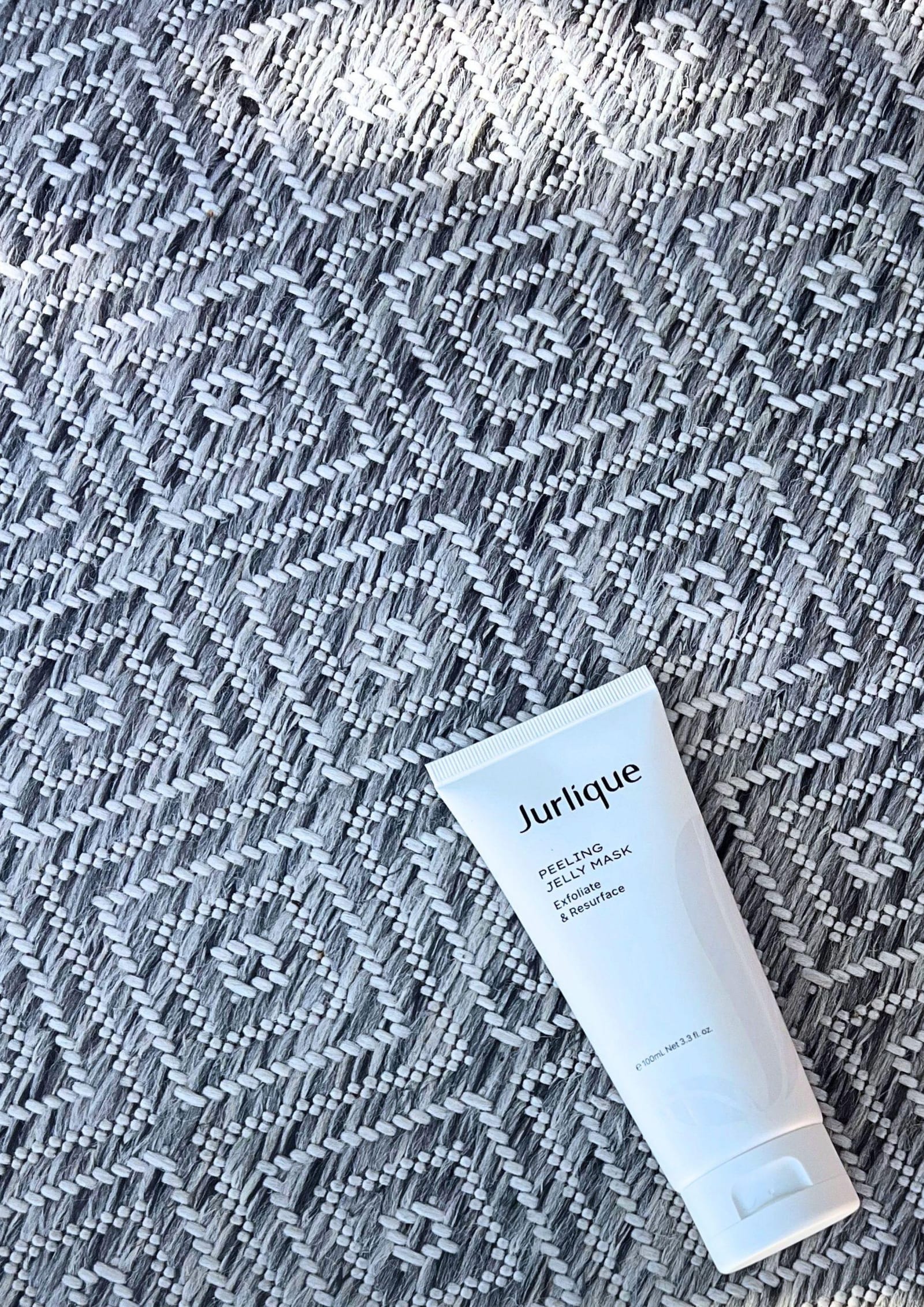 Jurlique skincare masks displayed outdoors