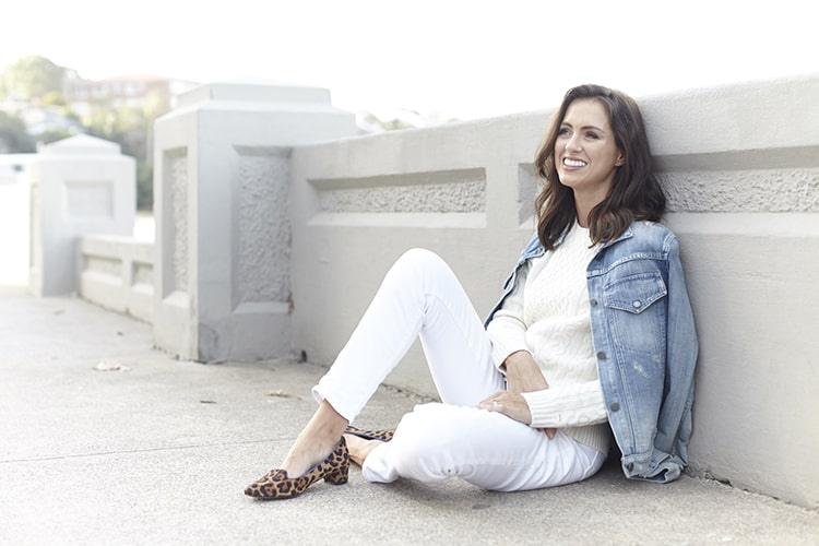 SIGOURNEY WEARS TOMMY HILFIGER CABLE KNIT SOLD OUT, CURRENT/ELLIOTT DENIM JACKET, $429, FROM BELINDA; HER OWN BODEN SHOES