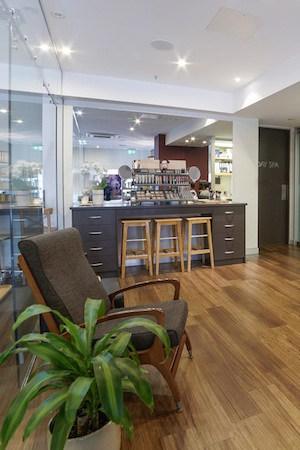 Bringing The Outside, In With Timbers And Greenery To Greet Clients