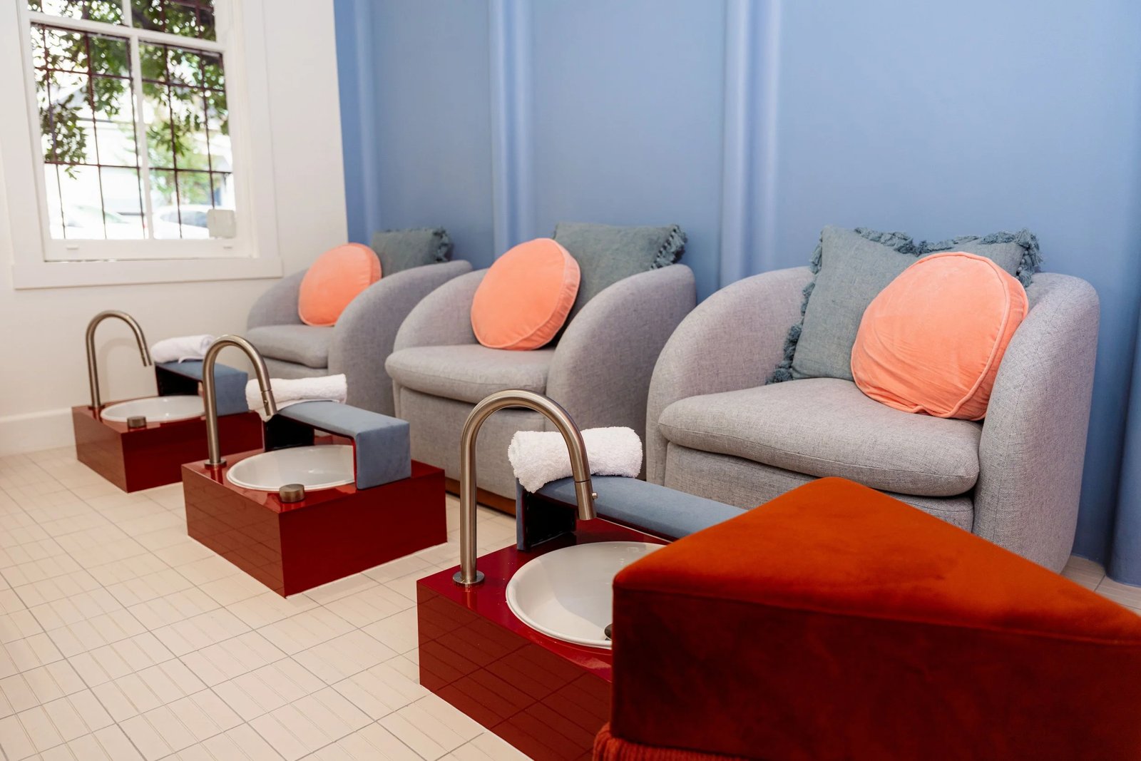 Pedicure chairs with velvet footrests at Rêve Skin + Beauty, Annandale