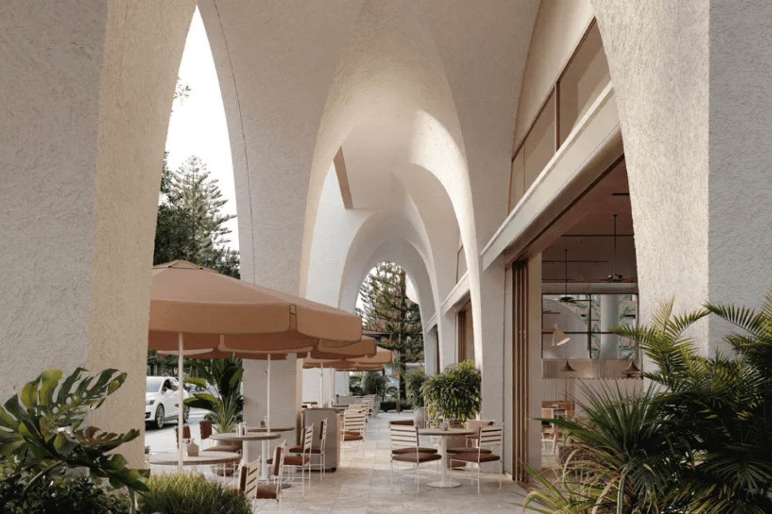 Italian restaurant at Mondrian Gold Coast with white linen, Burleigh Beach views and elevated breakfast