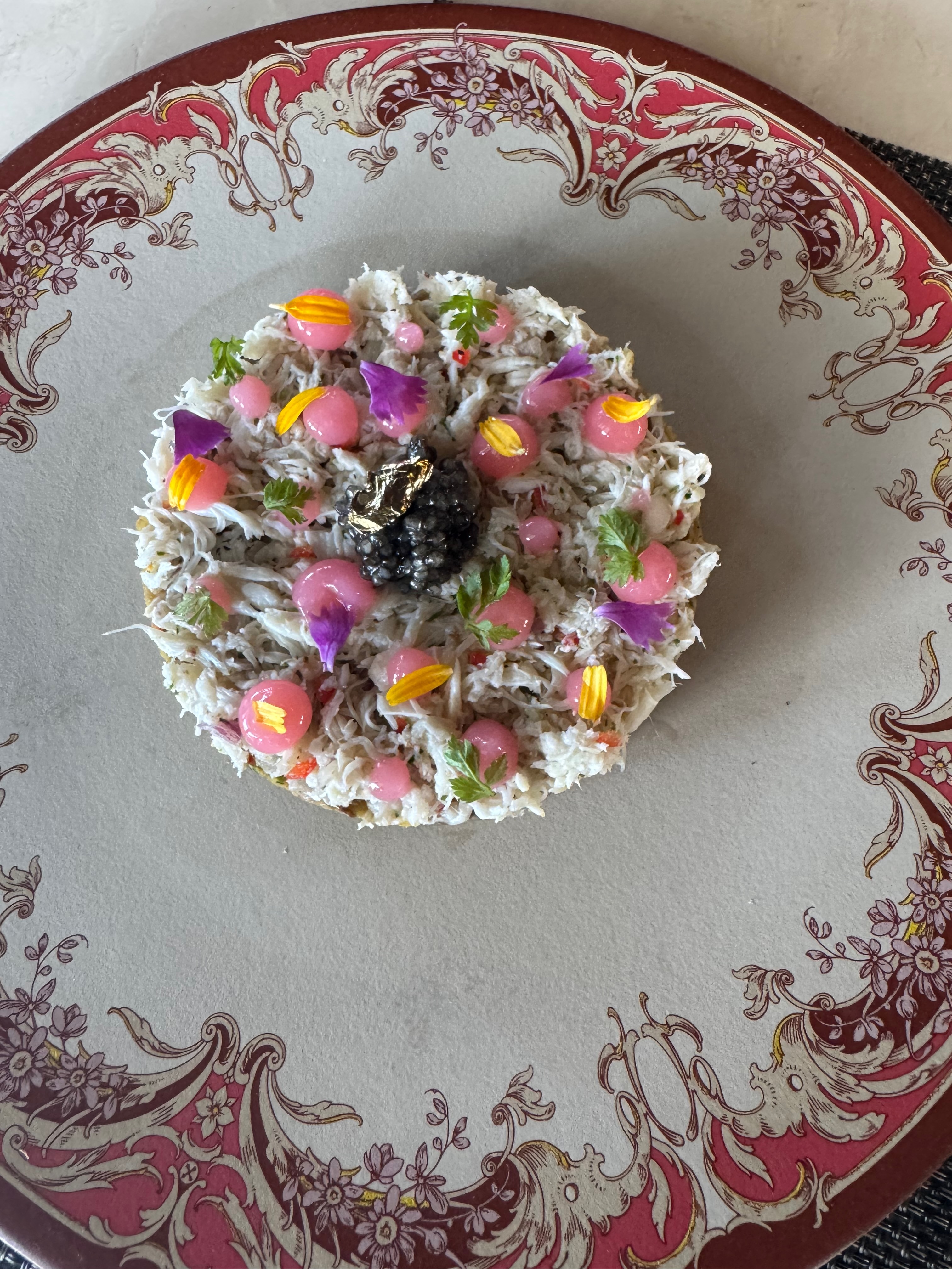 A beautifully presented plate of regional Indonesian food at Roso Restaurant, Bali Beach Hotel