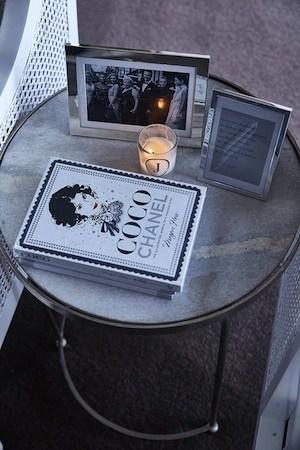 Jodi Gordon home decor with Coco Chanel book and candles