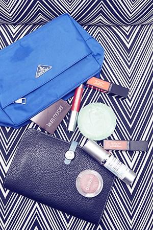 Laura Csortan Prada beauty bag and Hermes wallet