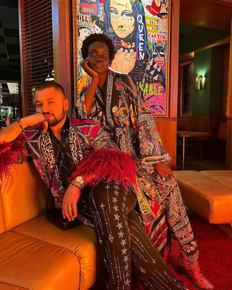 With fellow artist and friend Fuzz Ali, both looking seriously glam wearing Camilla IMAGE: INSTAGRAM @ATONGATEM