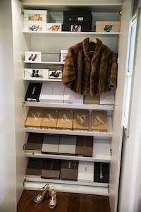 Kelly Stores All Her Shoes in Their Original Box with Polaroids Stuck to the Front so She Can Easily Find a Pair