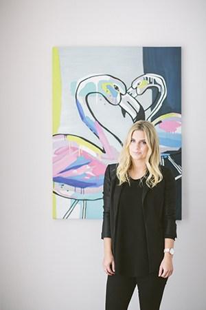 Lisa Hamilton at home with flamingo decor
