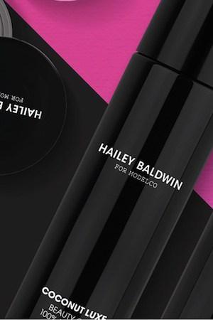 Hailey Bieber skincare and beauty product flatlay