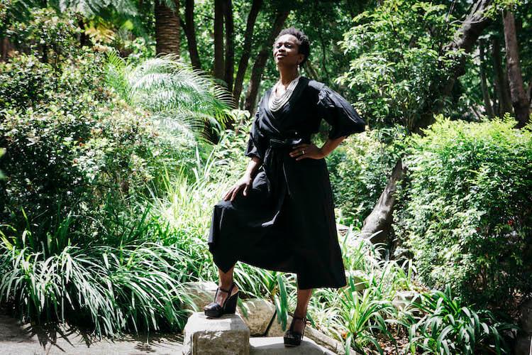 Aminata wears Elka Collective Media Dress