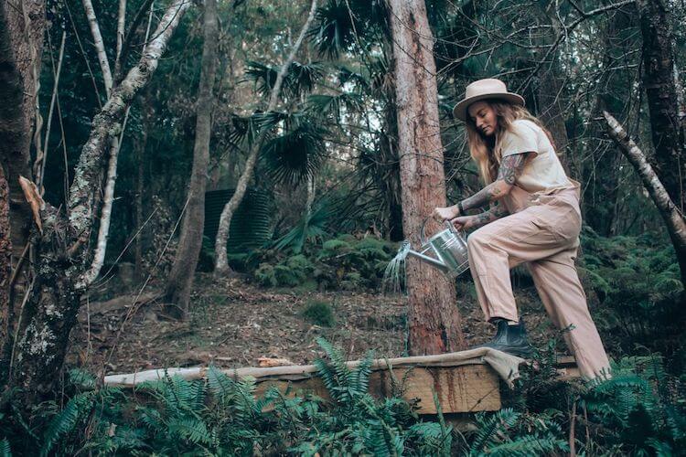 Jessi tending to the garden of the couple’s off-the-grid home