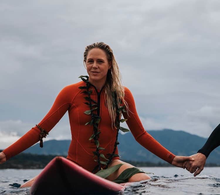 PARTAKING IN A CEREMONY FOR THE EDDIE AIKU BIG WAVE INVITATIONAL IN HAWAII IMAGE: JULIAN MARTIN VIA INSTAGRAM @CHRISENEVER
