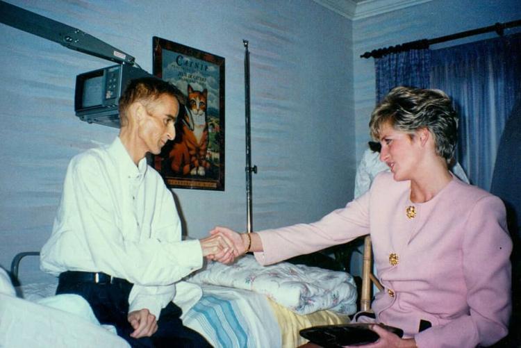 Princess Diana shaking hands with AIDS patients without gloves