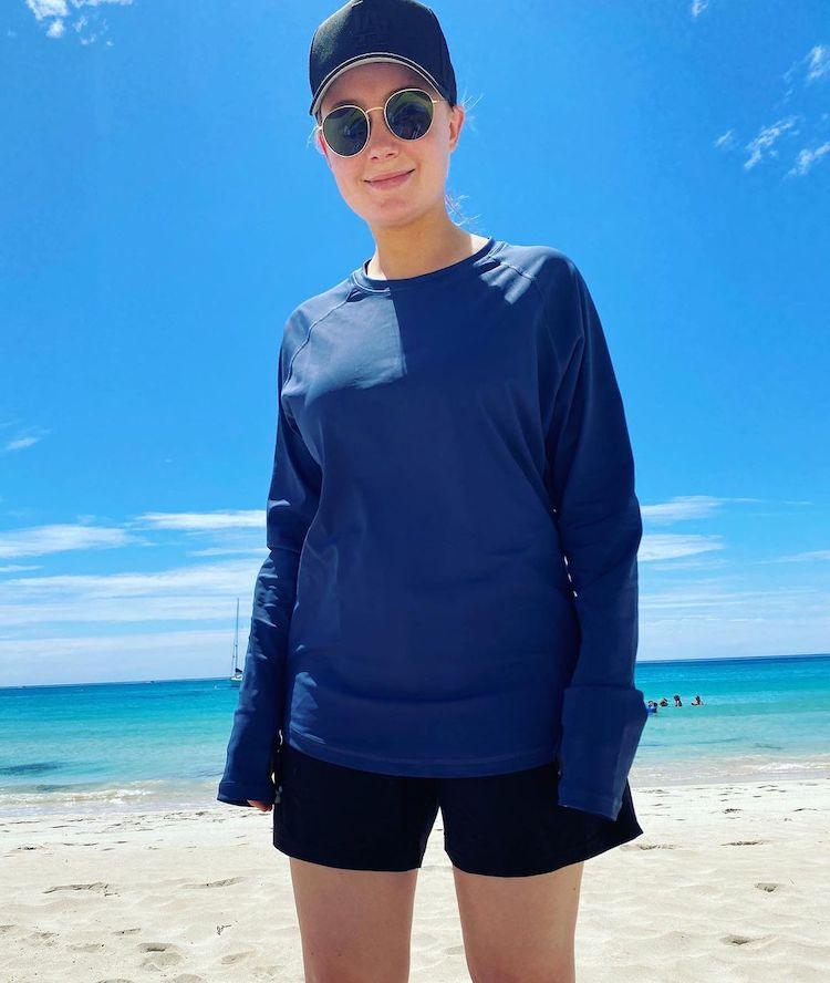 Keeping it real at the beach – sometimes the urge to swim means borrowing your boyfriend’s shorts IMAGE: INSTAGRAM @LOZCURTIS