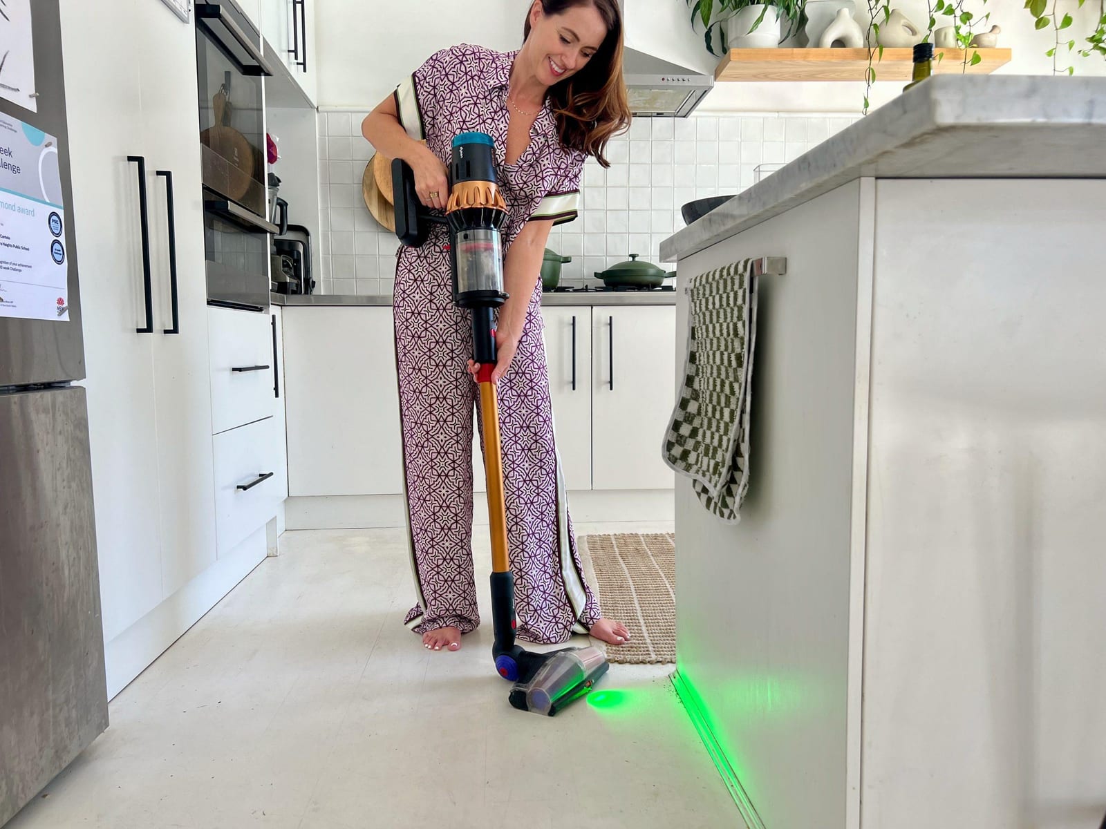 Dyson V16 cordless vacuum on white floorboards