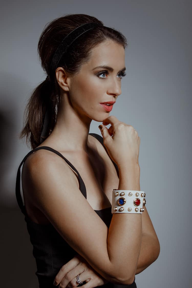 Sigourney Wears Chanel Cuff and Isabelle Quinn Dress