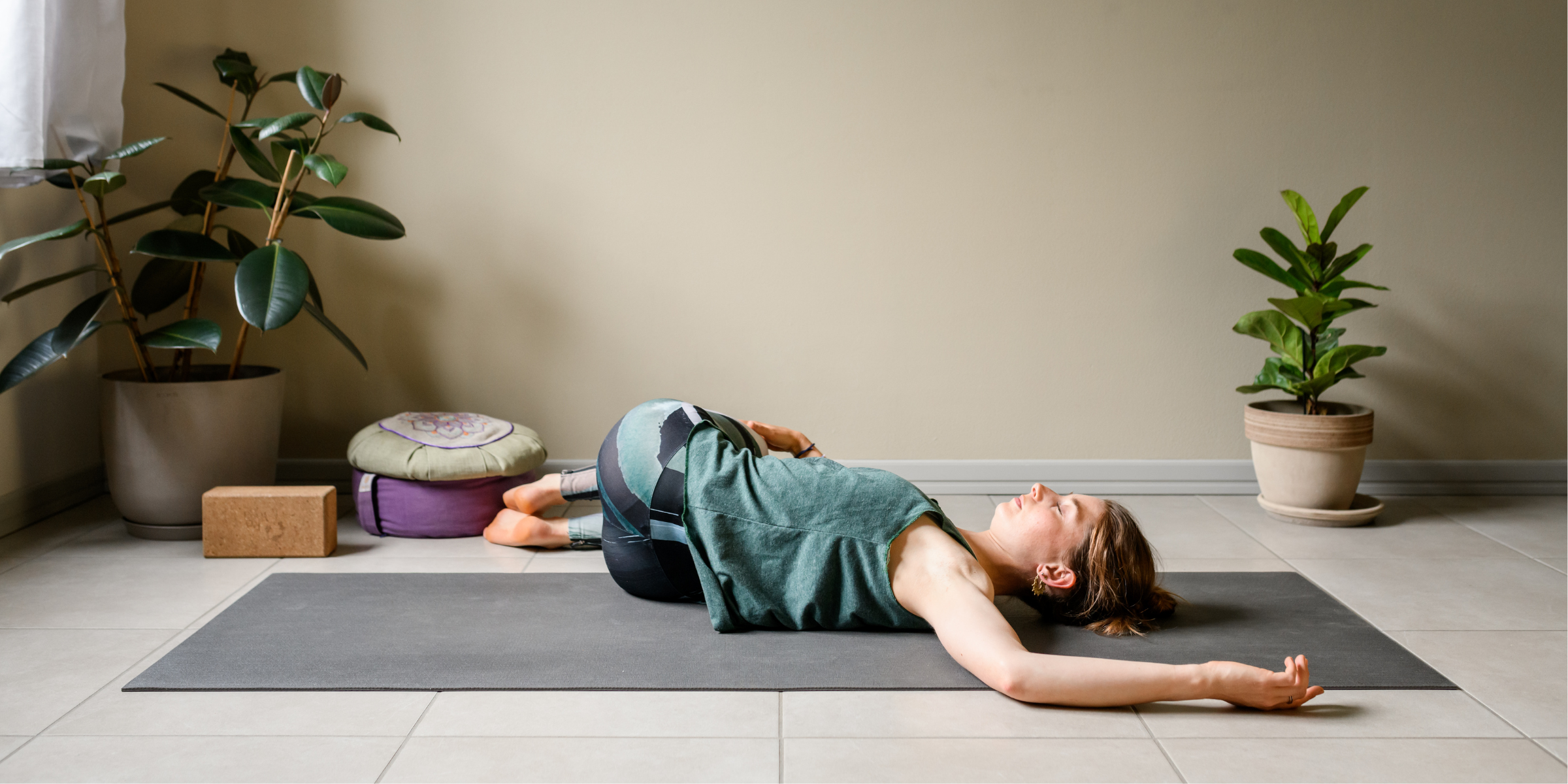 Reclined supine twist yoga pose for sleep