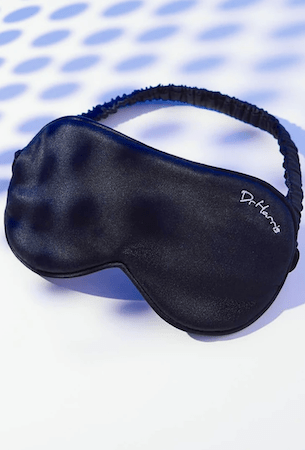 CurrentBody x Dr Harris Anti-Wrinkle Sleep Mask in black against a white surface