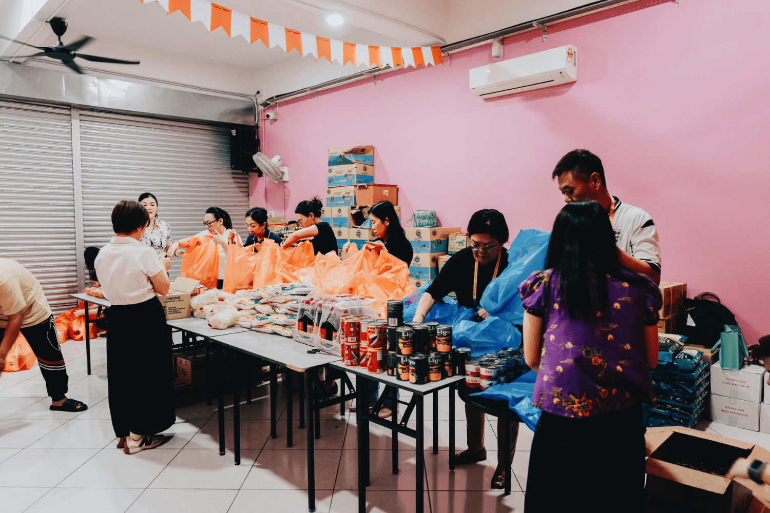 People at Kuching Aid Food Donation Packing