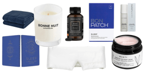 weighted blanket and Maison Balzac candle creating a calming bedroom ambience