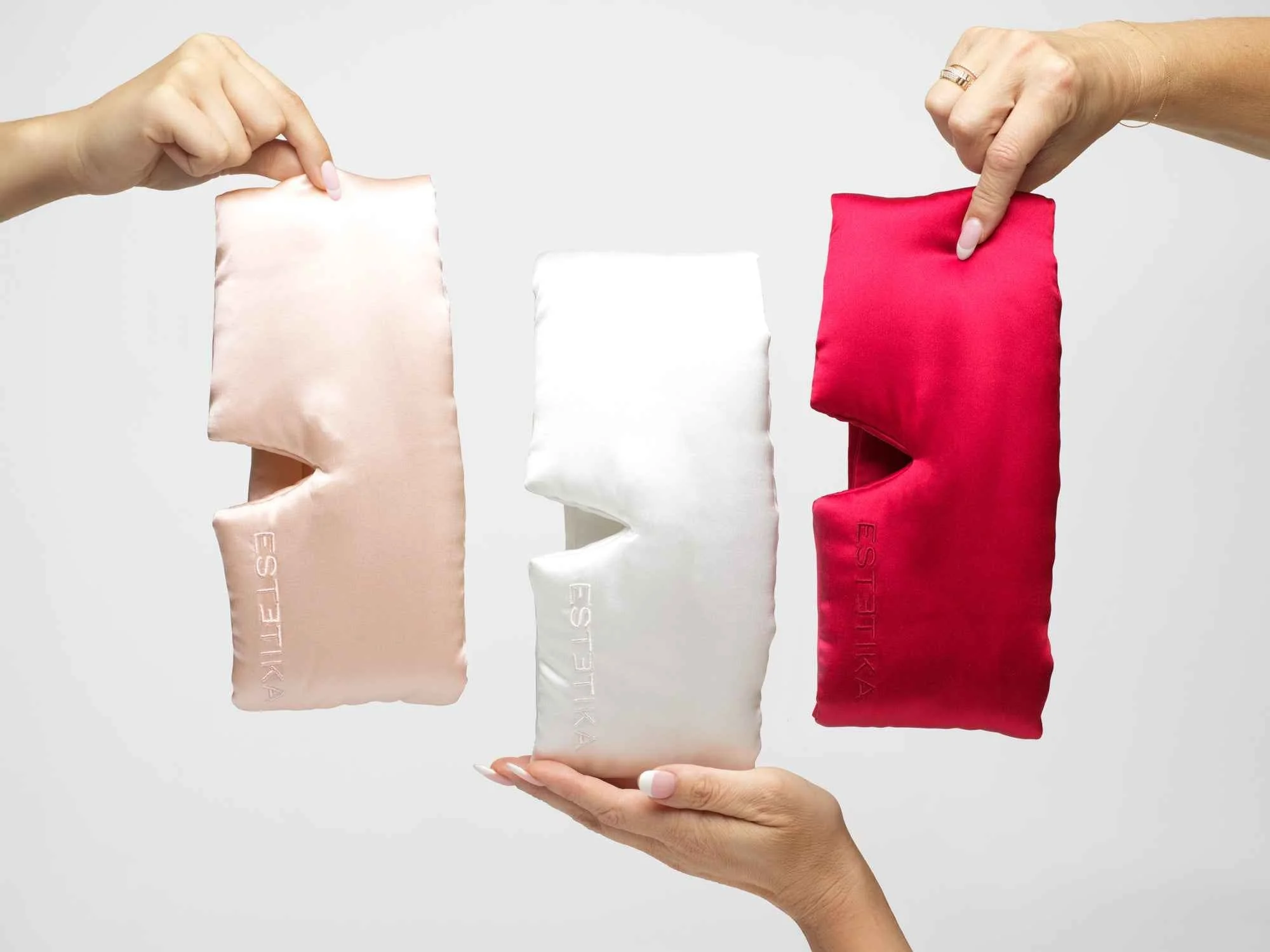 Estetika eye mask covering eyes in 3 different colors pink white and hot pink