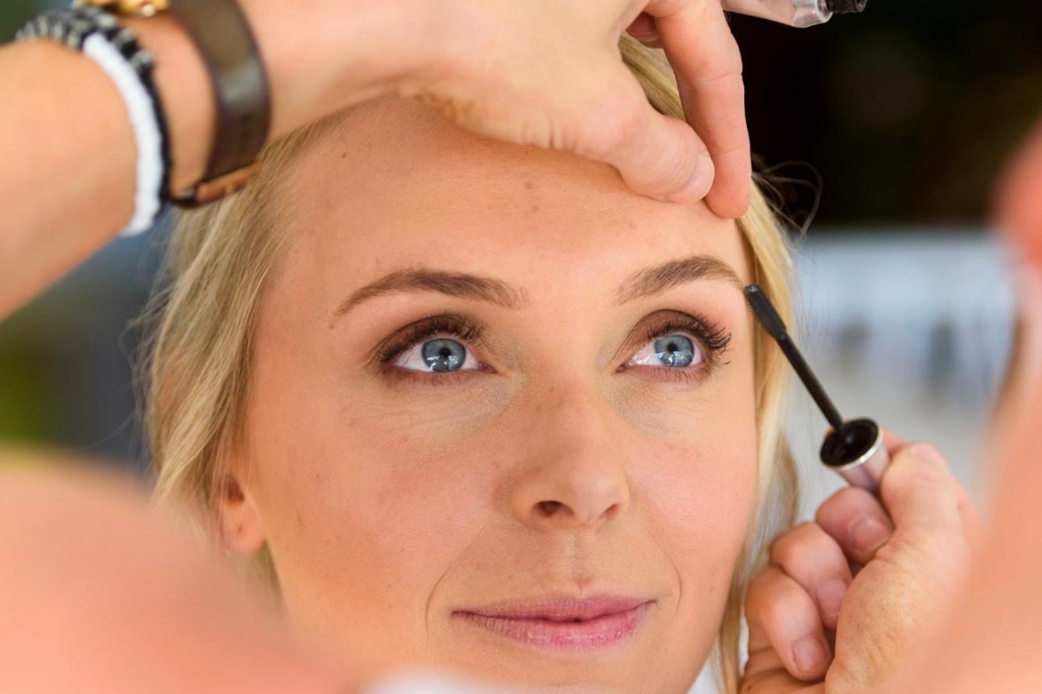 Professional brow shaping treatment demonstrating techniques for fuller, more defined brows