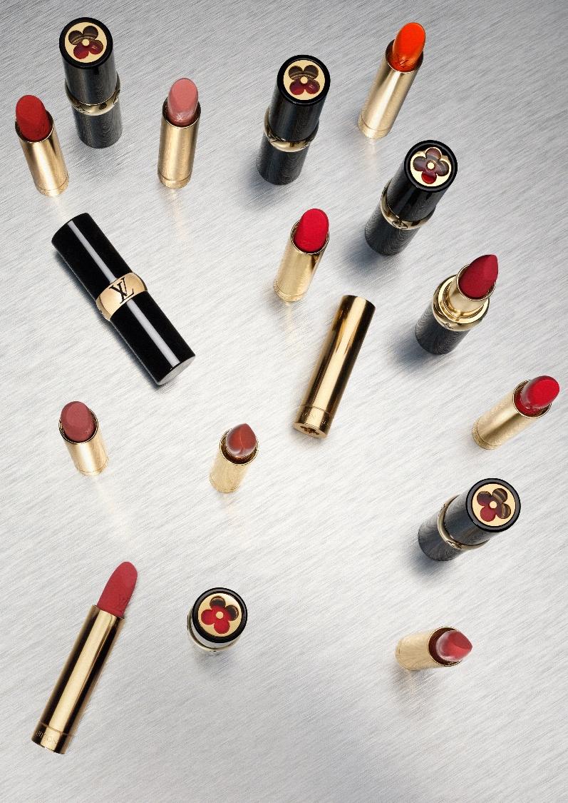 A flat lay of diverse Louis Vuitton lipstick colours.